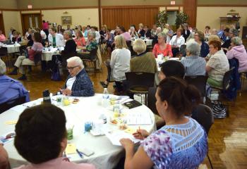 More than 100 women listen during the day of spirituality, “St. Elizabeth – Blessed is She.” (Photo by John Simitz)