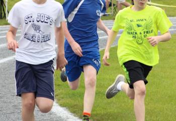 Runners from St. Joseph the Worker, Orefield; Our Lady of Perpetual Help (OLPH), Bethlehem; and St. Jane Frances de Chantal, Easton compete May 20 in the Diocesan Catholic Youth Organization (CYO) Track and Field Meet. OLPH placed first at the event with 138 points. 