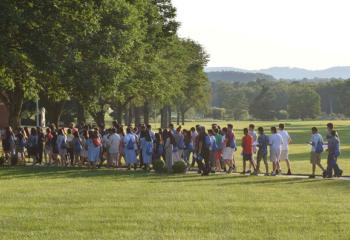 Campers, clergy and religious sisters join in the Rosary Procession. (Photo by John Simitz)