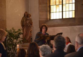 Marian Gehringer, parishioner of MBS, reads the first reading during Mass at SS. Peter and Paul.  
