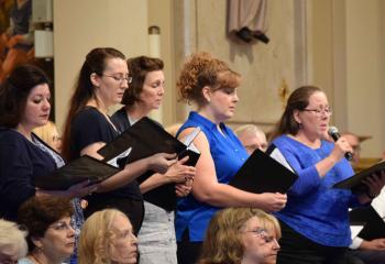 The Combined Choirs sing “Ave Maria,” which asks for the intercession of Mary.