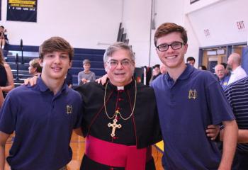 Students pose with Bishop Schlert. (contributed photo)