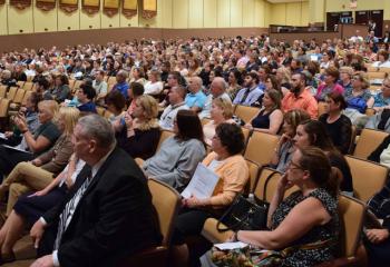 An estimated 1,000 educators for the Diocesan Catholic schools listen during the convention “All are Welcome in Christ.”