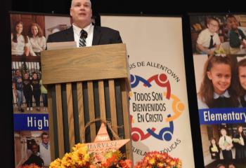 Dr. Philip Fromuth, Diocesan superintendent for Catholic education, welcomes educators to the convention.