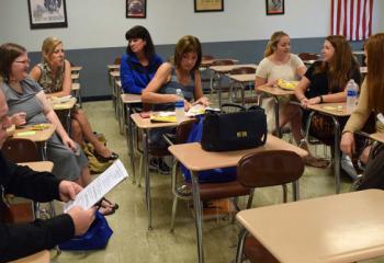 Staff from St. Joseph Regional School, Jim Thorpe take time for a brief discussion while enjoying lunch.