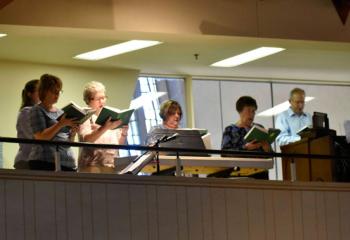 The St. Elizabeth choir sings a Marian hymn in honor of the 100th anniversary of Fatima. (Photo by John Simitz)