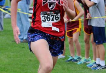 Isabel DeVos of St. Thomas More, Allentown is the first seventh- and eighth-grade girl to finish at the meet.