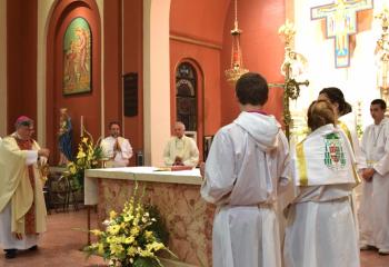 Bishop Schlert incenses the altar at St. Clare before greeting the faithful of Schuylkill Deanery during a special Mass. “Bishop Schlert has a ‘down to earth’ sense with people. He greeted everyone and spent time with them,” said Msgr. Glosser.