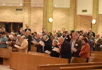 An estimated 100 stewards gather Nov. 20 for Evening Prayer to implore the Holy Spirit for greater guidance.