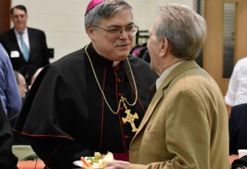 Bishop Alfred Schlert thanks Tony Martocci during the light reception honoring stewards for their dedication and support to parishes, schools and other diocesan ministries serving the Allentown Diocese.