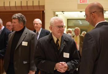 Tony Balistrere, right, principal of Berks Catholic High School, Reading, chats with Francis Bodner during the reception.