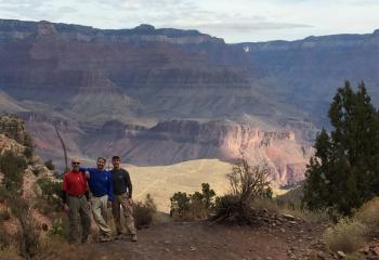 Pausing to take in the vast beauty of the Grand Canyon are, from left, Msgr. Thomas Orsulak, Father John Gibbons and Father Patrick Lamb.