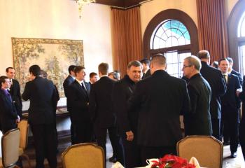 Diocesan seminarians, candidates and priests mingle during the luncheon. 