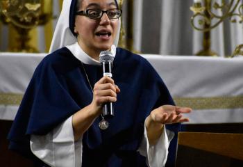 Sisters of Life (SV) Sister Gianna Maria speaks during the closing of Forty Hours. A native of Delaware, she works in the Bronx, New York in vocations ministry in the postulant house.