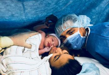 Nashaly Cruz Pagon and Osbel Polanco Calerdon greet their newborn daughter Nashbel Jan. 10. (Photo courtesy Maggie Sweet)