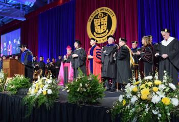 Gerard Joyce, executive vice president of DeSales, serves as master of ceremonies during the inauguration ceremony.