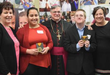 Bishop Schlert, center, congratulates scholars and staff from special learning centers, from left: Mary Adams, principal of John Paul II Center for Special Learning, Reading; Jennifer Valdez-Urbina; Brody Kleckner; and Elizabeth Grys, principal of Mercy School for Special Learning. Not pictured are Eduardo Barcenas of St. Joseph Center for Special Learning, Pottsville and Roobhen Smith, principal. 
