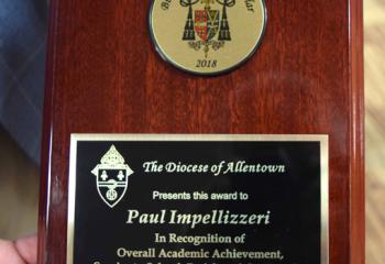 The plaque presented to Paul Impellizzeri and other eighth-grade scholars entering high school.