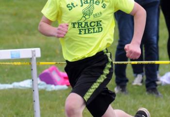 John-Paul Pierce of St. Jane Frances de Chantal, Easton heads to the finish to win the eighth-grade boys’ 400.