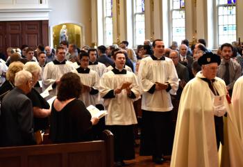 Seminarians and members of the Knights of Columbus process into the Cathedral.
