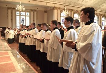 Seminarians join clergy and laity singing the Litany of Supplication (Litany of Saints).