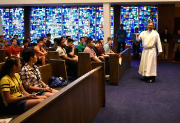 Father Keith Laskowski presents the talk “Striving for Integrity” to boys and girls July 16 in Connolly Chapel.