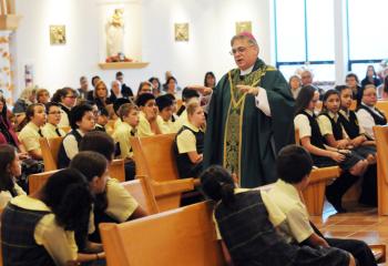 Bishop Alfred Schlert speaks to the school community during his homily at St. Elizabeth of Hungary.