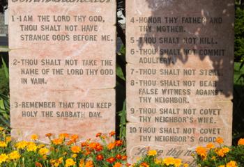 Marigolds adorn the Ten Commandments at St. Joseph the Worker.