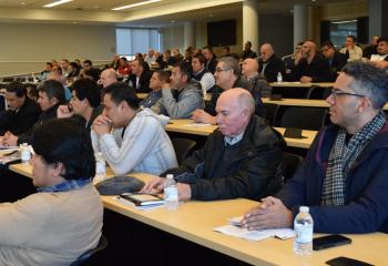 More than 100 men gather for the Spanish-speaking presentations at the Gambet Center.