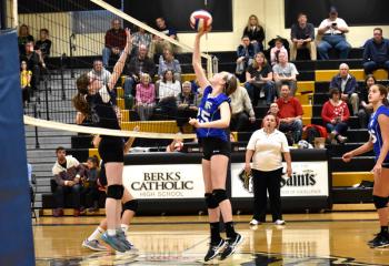 Carly Campbell, right, goes on the attack for Our Lady of Perpetual Help (OLPH) against LaSalle.