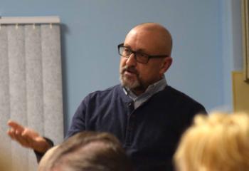 Dr. Larry Chapp, co-owner of Dorothy Day Catholic Worker Farm, offers input during the discussion focusing on the challenges of teaching the faith.