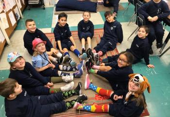 Putting their feet together for Crazy Hat and Sock Day at St. Elizabeth Regional School, Whitehall.