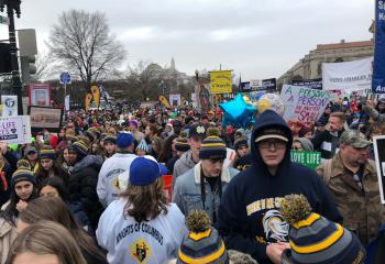 Plenty of Notre Dame High School, Easton hats can be seen among the marchers. (Photo courtesy of Father Gene Ritz, chaplain of Notre Dame High School)
