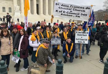 The group from St. Jane gathers at the steps of the Supreme Court building. (Photo courtesy of Andrew Azan III)