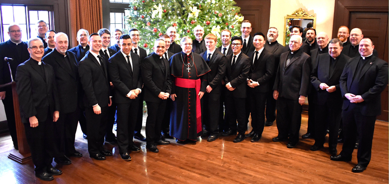 Seminarians with Bishop Schlert, center, and priests who are seminarian pastors and members of the Commission for Orders and Ministries, from left: Father Eugene Ritz; Father Anthony Mongiello; Father Donald Cieniewicz; Father Keith Mathur; Monsignor Joseph DeSantis; Father David Loeper; Philip Maas; Keaton Eidle; Father Frank Natale, M.S.C.; Miguel Ramirez; Robert Rienzo; Deacon Juan Eduardo Rodriguez; Tyler Loch; Father Michael Mullins; Monsignor Thomas Orsulak; Kolbe Eidle; Aaron Scheidel; Anh Do Mai; Matthew Kuna; James Hy Ngô; Father Thomas Bortz; Alexander Brown; Monsignor John Grabish; Father Adam Sedar; Monsignor Daniel Yenushosky; Monsignor John Murphy; Father Mark Searles, director of vocations promotion; Monsignor David James, vicar general; and Father Christopher Butera, director of seminarian formation.