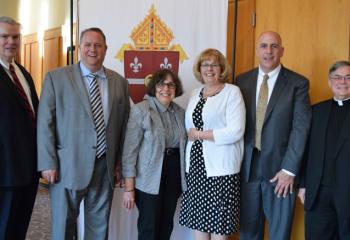 Gathering at the dinner are, from left: Philip Fromuth; John Petruzzelli, retiring principal of Bethlehem Catholic High School (Becahi); Dr. Joanne Lofaso, retiring principal of St. Michael the Archangel School, Bethlehem-Coopersburg; Jody Myers, retiring principal of St. Joseph the Worker School, Orefield; Dr. Gerald Joyce, chair of the diocesan board of education; and Msgr. Alfred Schlert, diocesan administrator. Not pictured is Karen Gabryluk, retiring principal of Sacred Heart School, Bath; and Sisters,