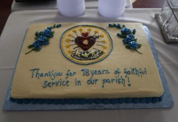 he decorative cake honoring the sisters’ service, specially designed with the IHM logo. . (Photo courtesy Sister Teresa Ballisty)