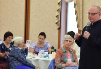 Father Richard Brensinger, who serves as diocesan director of campus ministry, and chaplain for Albright College, Reading and St. Christopher Newman House, Kutztown University, presents the morning talk during the Bishop’s Commission for Women Day of Spirituality. (Photo by John Simitz)