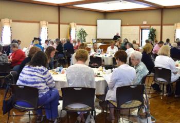 Women pray the Liturgy of the Hours to begin the day. (Photo by John Simitz)