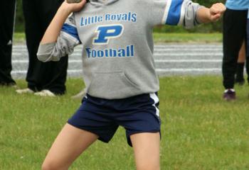 Isabella Reto, Immaculate Conception, Pen Argyl, begins to launch the shot during the shot put event.