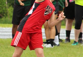 Klaudia Salvino, St. Thomas More, Allentown, competes in the shot put event. 