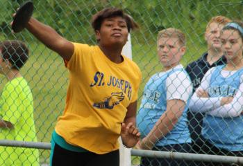 Madison Moore, St. Joseph Regional Academy, Jim Thorpe, throws the discus.