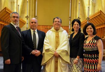 Newly ordained Benedictine Father Linus Klucsarits (formerly Paul Klucsarits), center, celebrates his ordination June 3 at St. Bernard’s Abbey Church, Cullman, Alabama, with his siblings, from left, George Klucsarits, David Klucsarits, Ann Fitzgerald and Margaret Best. Father Linus is a parish son of the Cathedral of St. Catharine of Siena, Allentown. (Photo courtesy of Father Linus Klucsarits)