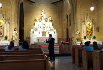 A man who is a Third Order Carmelite gives Fiat campers a tour the Carmelite Monastery, Coopersburg on July 19. (Photo courtesy Sister Rose Bernadette Mulligan, IHM)