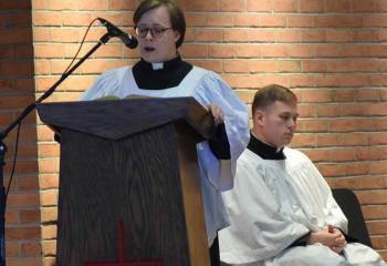 Seminarian Kevin Gembarksi serves as lector at the opening Mass. (Photo by John Simitz)