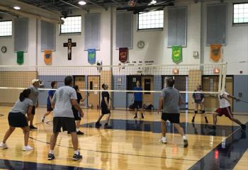 A recent game of recreational volleyball serves up a chance for fun and fellowship at St. Ignatius Loyola. (Photos courtesy Father Stephan Isaac)