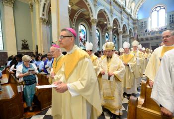 Bishops process into the cathedral.