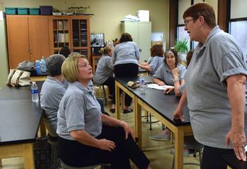 Diana Kline, left, principal of St. Ann School, Emmaus, talks with Mary Ott, fifth-grade teacher at St. Ann School.