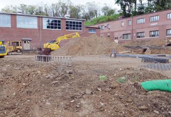 Construction work is in progress on the site of the original church structure that was razed. 