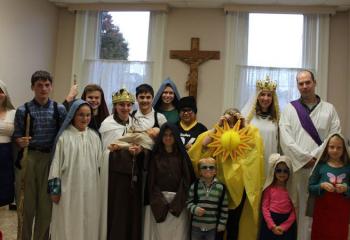 Families from Schuylkill and Carbon deaneries prepare to present a play about Fatima at St. Patrick, Pottsville. (Photo by Debbie Walker)